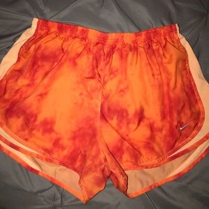 Orange Nike tie dye shorts